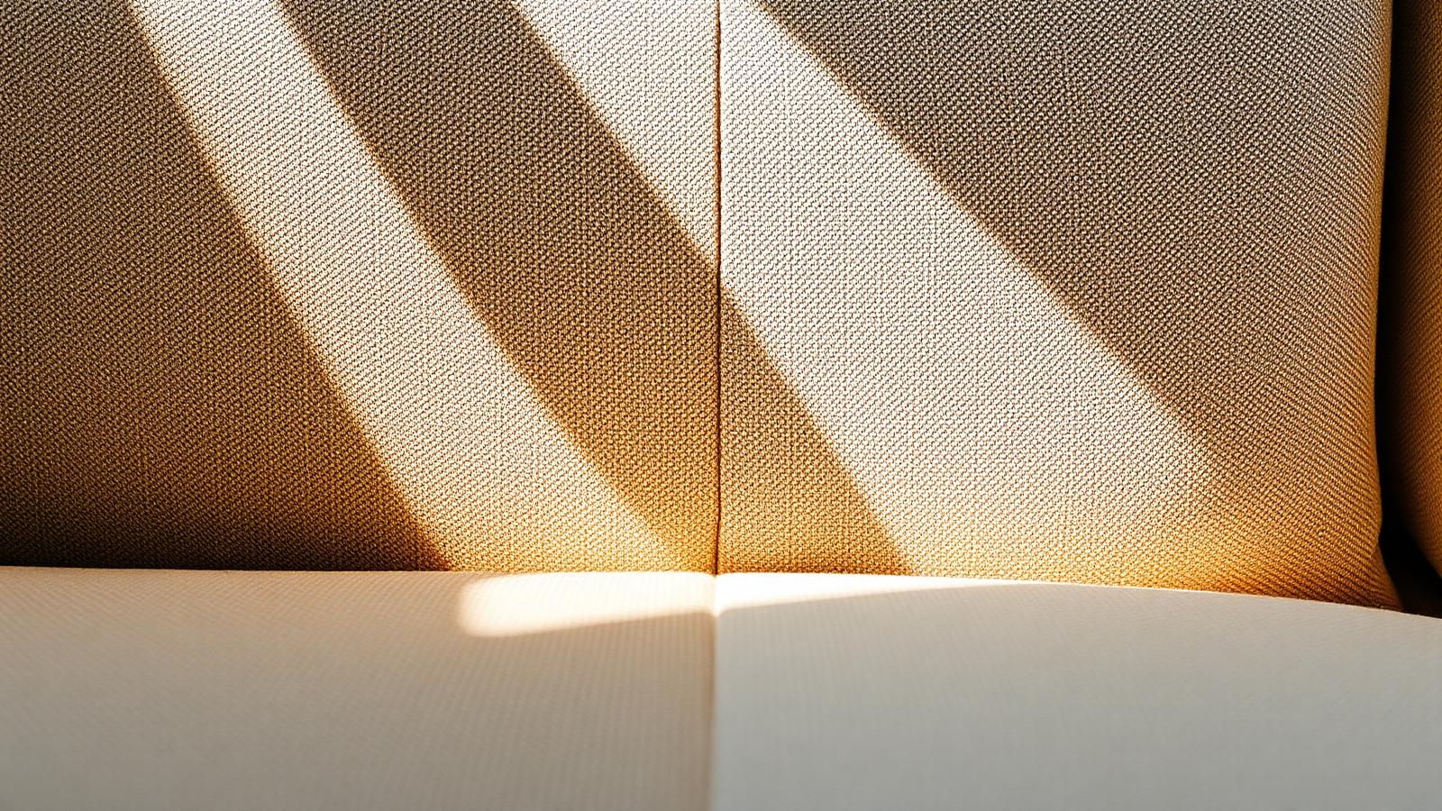 Fabric couch cushion cleaned on one half — the difference after a deep extraction clean